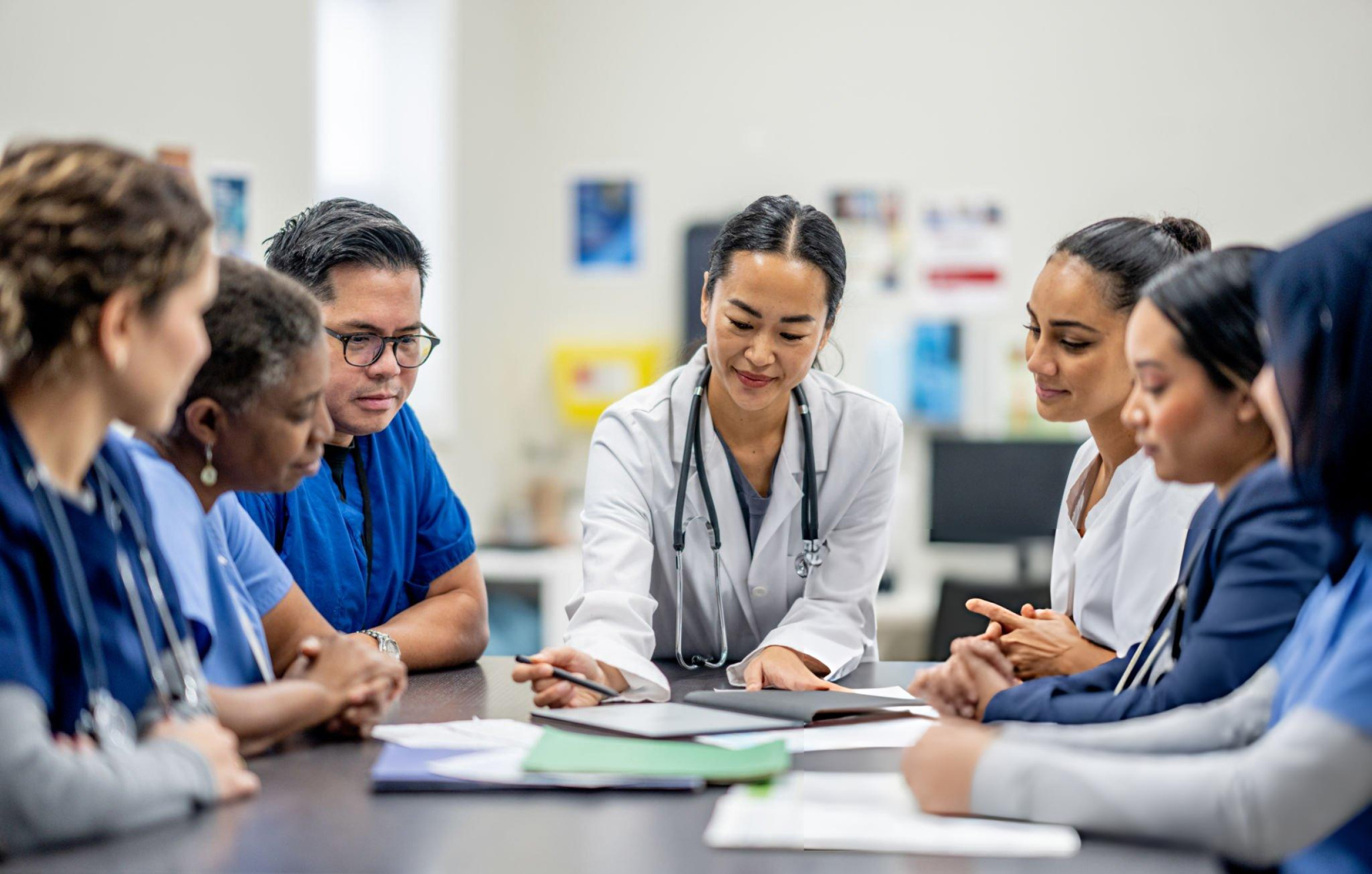 Clinical trial meeting in Vietnam with researchers, CRCs, and CRAs discussing study protocols at VSCR
